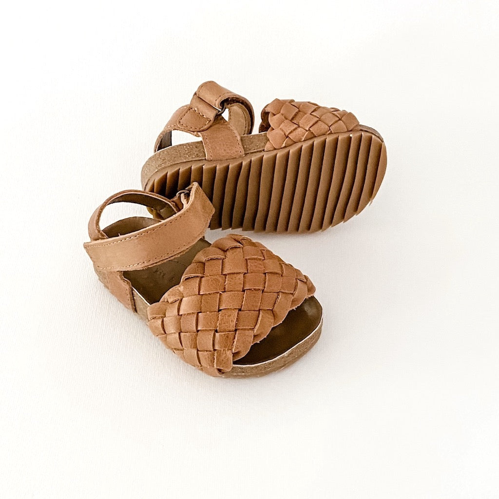 Kit & Kate Soleil weave woven leather sandals with a soft moulded solebed and made from natural leather for babies, toddlers and children shoe sizes in Tan - perfect for beach days, parties and trip to the playground while enjoying the sunshine