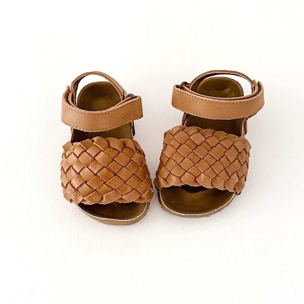 Kit & Kate Soleil weave woven leather sandals with a soft moulded solebed and made from natural leather for babies, toddlers and children shoe sizes in Tan - perfect for beach days, parties and trip to the playground while enjoying the sunshine and playing at daycare