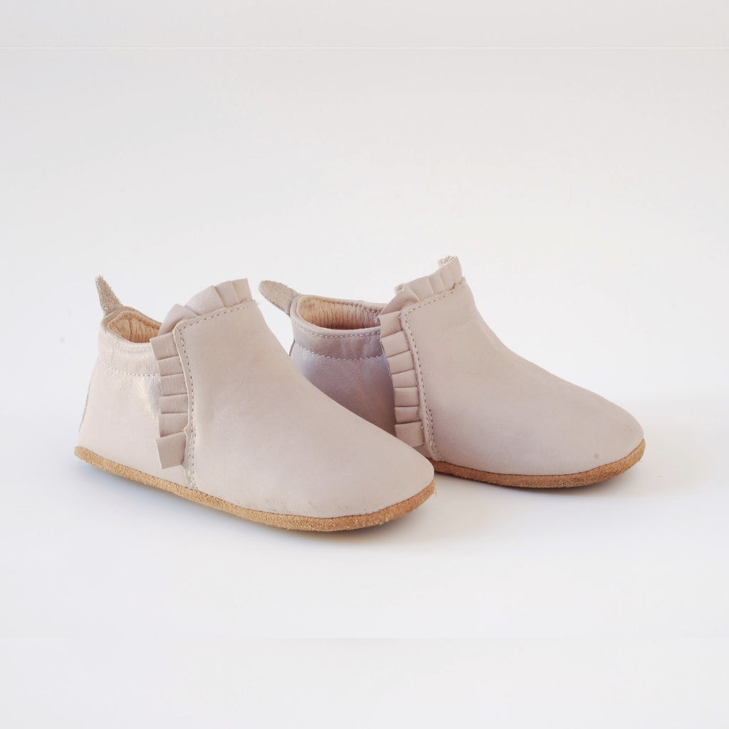 baby boots in a lacey style. Stretch elastic band, soft soles, natural leather - baby shoes sizes 1 year to 2 years. Great for daycare and childcare